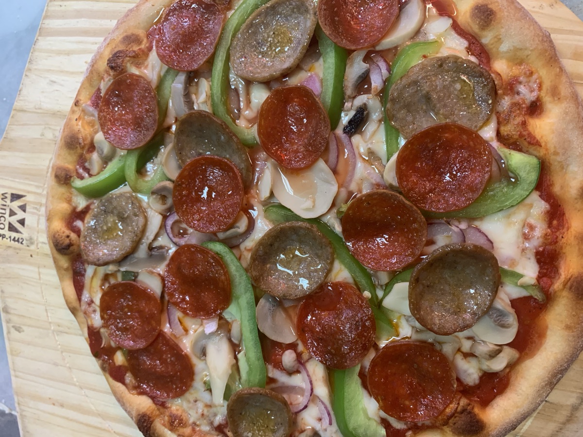Taste of Italy specialty pizza